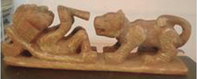 Figura 1. Escultura en hueso de la SNSM (Tairona). Representa a un chamán (mamo) semirecostado con una flauta,