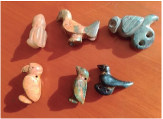 Figura 12. Conjunto de aves canoras esculpidas en